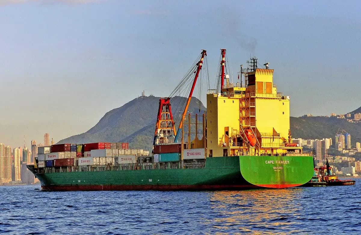 A loaded container ship at anchor