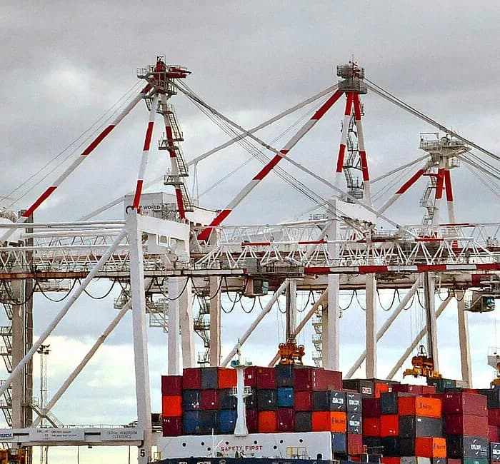 Gantry cranes loading containers at a Melbourne container terminal